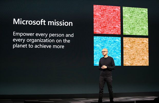Microsoft CEO Satya Nadella speaking onstage at MWC Barcelona