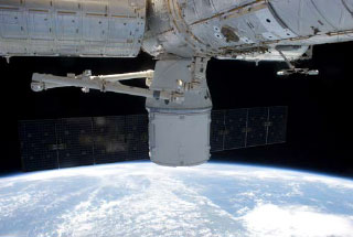 Dragon capsule docked to the ISS